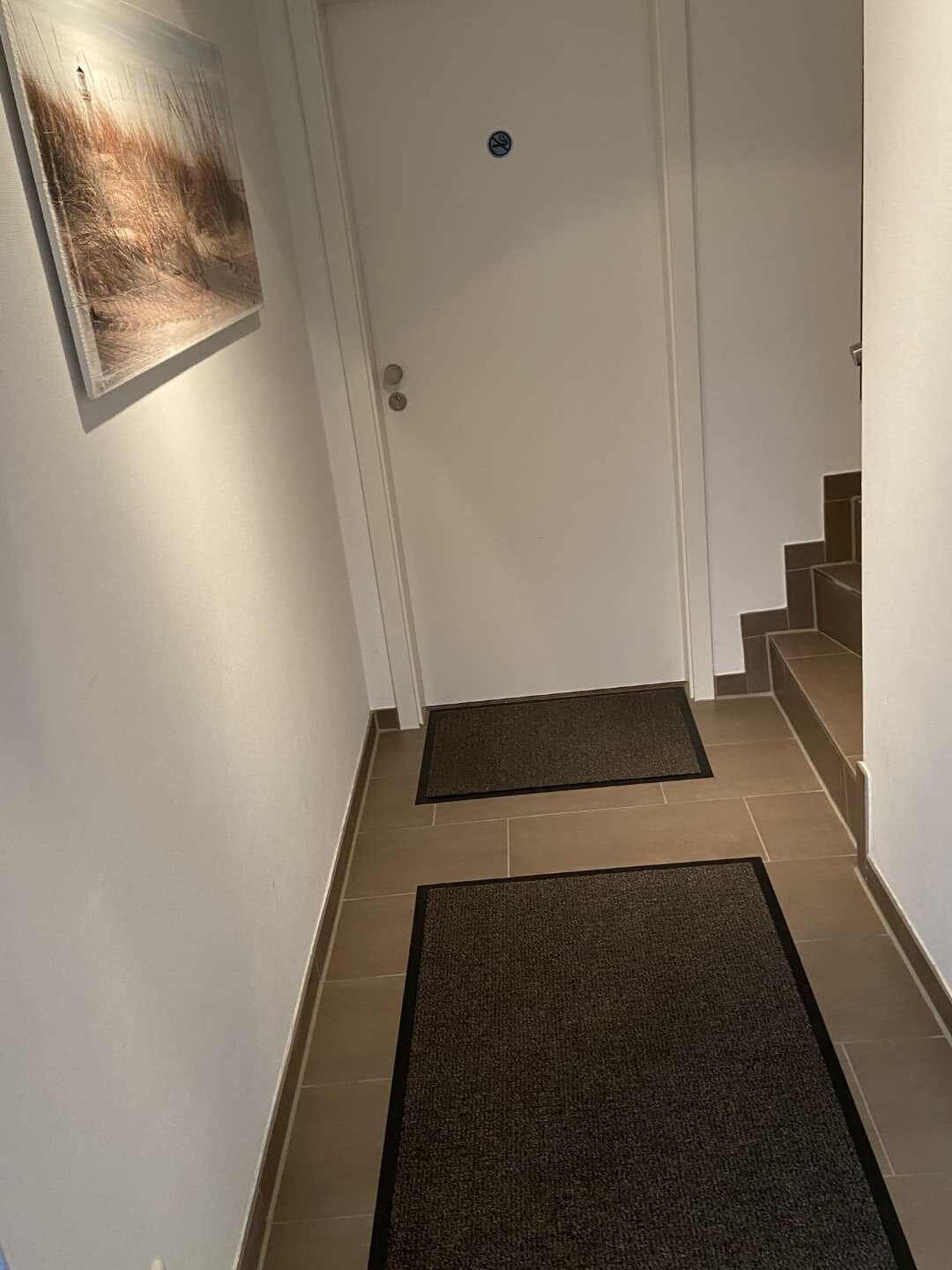 Neue Fußmatten im Hausflur